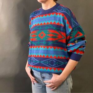 Descente Blue and Red Crewneck Sweater with Geometric Patterns